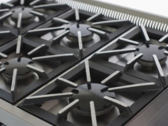 COCINA 6 HORNALLAS MINI CON PARRILLA SIN HUMO PUERTA VIDRIO NEGRA REJAS FUNDICION GAS NATURAL SOL RE